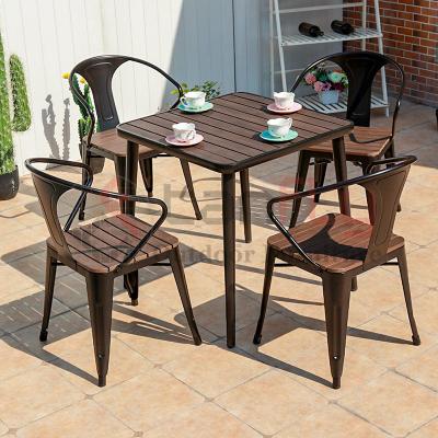 China Waterproof Hot Selling Dining Table Set Modern Outdoor Garden Furniture Tables And Chairs for sale