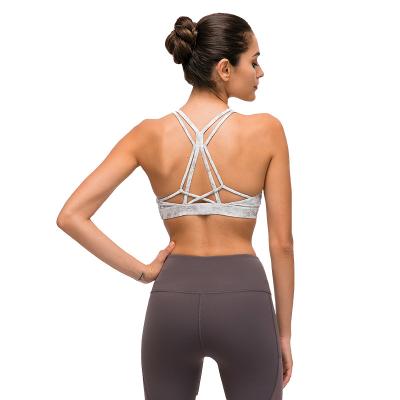 China Anti-Shrinkage Stripes Crossing Back Beauty Yoga Bra No Steel Ring Sport Bra Shockproof Fitness Bra for sale