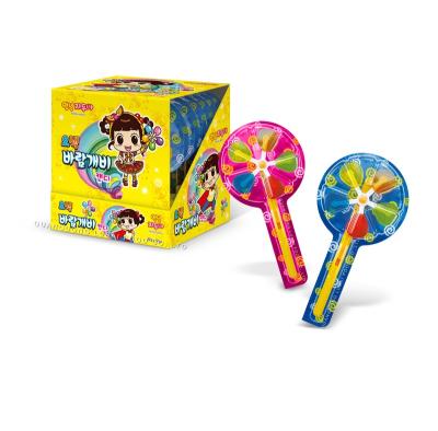 China Glucose Multi-flavor Sweet Colorful Spinning Windmill Lollipop Candy for sale