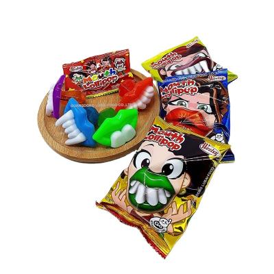 China New type fruit flavor mouth buck tooth lollipop low sugar colorful sweet candy for sale