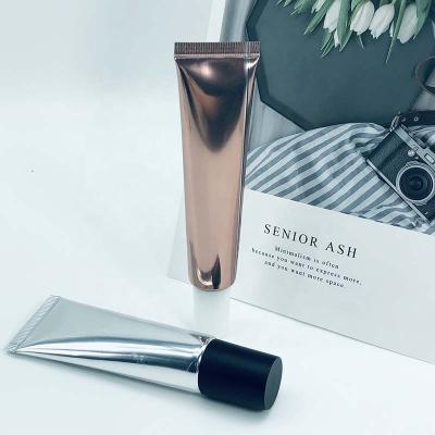 China Cosmetics Round Aluminum Barrier Laminated Soft ABL Cosmetic Packaging Tube With Screw Cap For Hand Cream for sale