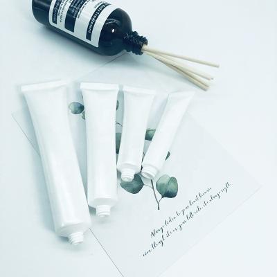 China Cosmetic in stock empty plastic tube skin care cosmetic package for body lotion for sale