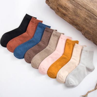 China Viable Casual Socks Men And Women Solid Color Bamboo Fiber Tube Plain Socks for sale