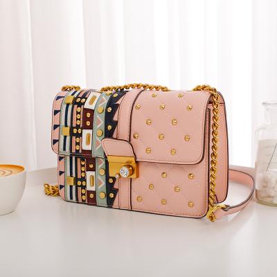 China Fashion\Comfortable Single Bag\Goods 2021 New PU Color Shoulder Lock Diamond Messenger Leather Lady Bags for sale