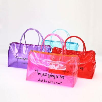 China Customized Waterproof Colored Clear PVC Duffel Bag Waterproof Colorful Women's Travel Duffel Bag for sale