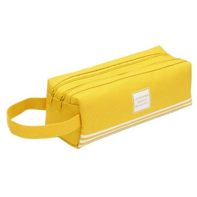 China Simple creative and large capacity cute portable pencil bag color double layer pencil case for sale