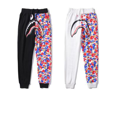 China 2023 Best Selling BAPE Anti-Wrinkle Pants Drawstring Print Mouth Shark Edge Half Color Oversized Custom Pants Solid Color Fashion for sale