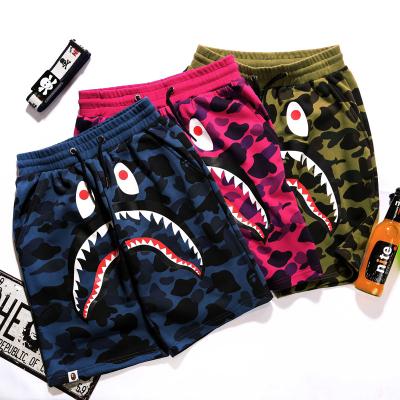 China 2023 Hot Selling BAPE Breathable Shorts Shark Print Classic Camouflage Loose Cargo Gym Beach Men And Women Couples Loose Shorts for sale