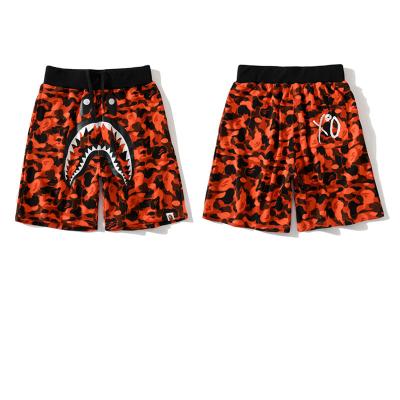 China New BAPE Shorts Summer Shark Mouth Printing Fashion Loose Drawstring Orange Men's Breathable Spooky Shorts Spring Skull Letter Sports Shorts for sale