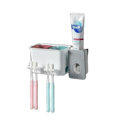 China Viable Make Life Reassuring Easy Pp+ps Material Toothpaste Dispenser Wall Mounted Toothbrush Holder for sale