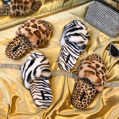 China Autumn Winter Fashion Furry Black New Fashion White Sandals And Slippers Leopard Print Jtfur For Women's Clothing External Slippers for sale