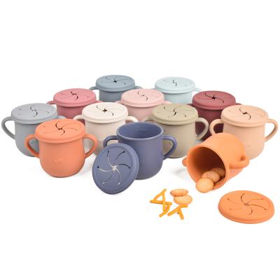 China New Design Custom BPA Free Reusable Toddler Training Cups With Handles Silicone Baby Snacks Cup for sale