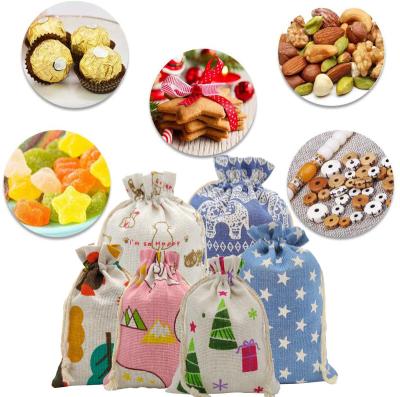 China CP010B 24Pcs Reusable Premium Candy Treats Cotton Christmas Holiday Party Happy Drawstring Gift Bag Wrapping Set for sale