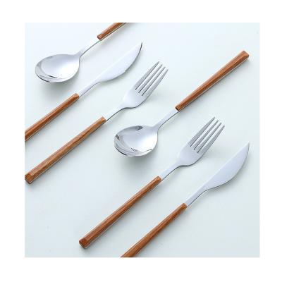 China Disposable Wooden Handle Stainless Steel Knife and Fork Spoon, Statistical Net Red Steak Knife and Fork Spoon for sale