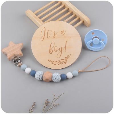 China Safe Beach Baby Wooden Teether 3PCS Set Silicone Nipple Milestone Card Baby Star Beech Wood Pacifier Clip for sale