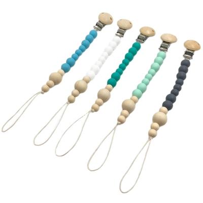 China Non-Toxic Mummy Nursing Silicone Waldorf Teether And Wooden Bead Pacifier Chains Clip For Baby Chew for sale