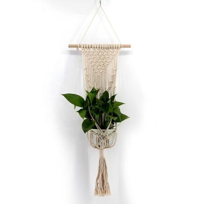 China Simple Handmade Natural Chunky Macrame Wall Plant Hanger for sale