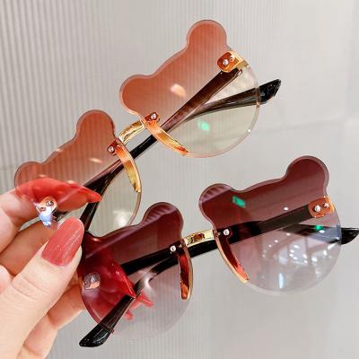 China Fashion Sunglasses Shape Little Bear Baby Kids Sunglasses Colorful Gradient Cup Frameless Boys Girls Sunglasses 2021 for sale