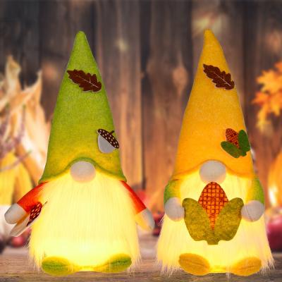 China 2021 New Autumn Mall Decoration Mall Home Thanksgiving Pendant Harvest Festival Maple Pumpkin Leaf Faceless Doll for sale