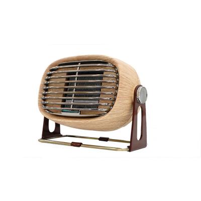 China Cheap Factory Price Small Mini Easy Home 3 Second Quick Heating Desktop PTC Electric Portable Ceramic Heater for sale