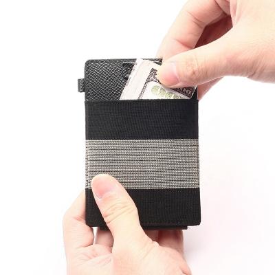 China QS7073 Genuine Leather RFID Blocking Wallet Smart Card Holder Wallet With Elastic Money Strap for sale