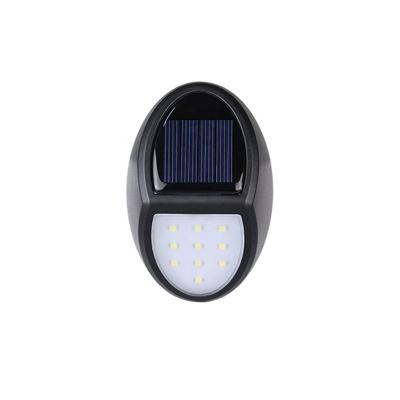 China Factory-direct sale Polycarbonate Solar Wall Lamp Outdoor Solar Garden Led Solar Wall Light for sale