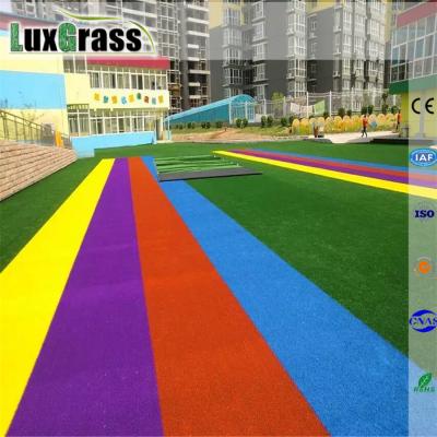 China Residential Colorful Artificial Grass Carpet Kids Playground Lawns Artificial Turf Prices for sale