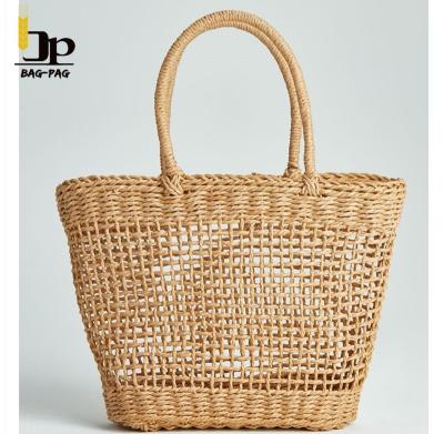 China 100% New Eco-friendly Hollow Women Handmade Bags Ladies Bag Summer Straw Shopping Tote for sale