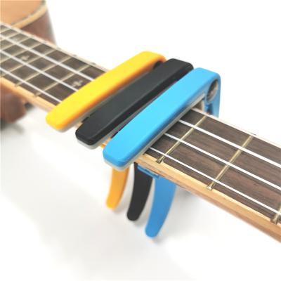 China Guitar. High Quality Guitar Accessories Color Ukulele Aluminum Alloy Acoustic Ukulele Capo for sale