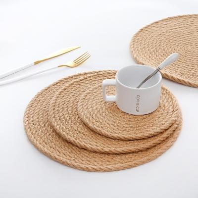 China Viable hot sale natural hand braided sea grass table pad, wholesale price place mat, round shape different size place mat for sale