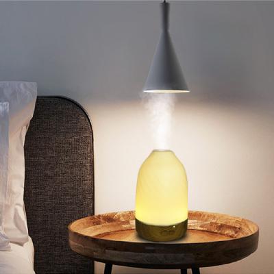 China Amazon New 200ml Ultrasonic Household Small Night Light Hotel Lamp LED Air Humidifiers For Home for sale