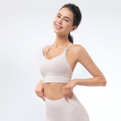 China Newest Women's Fitness Women's Yoga Clothing Design Yoga Tops Sexy Watering Process Watering Girls Sports Yoga Bra Running Shockproof Bra for sale