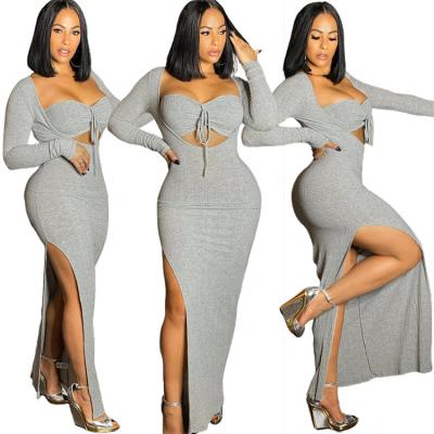 China Breathable Sexy Front Connection Dresses Women Knitted Long Sleeve Split Hollow Out Dresses For Women Ladies Casual Wear for sale