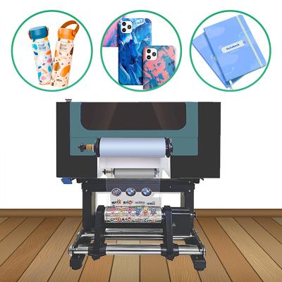 Cina Stampa UV Dtf a rullo da 300 mm con 2 teste Xp600 in vendita