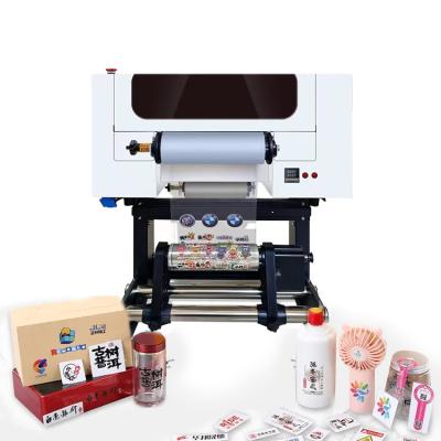 Cina Stampa DTF A3 UV con laminatore roll to roll all-in-one Stampa DTF A3 UV per adesivi in vendita