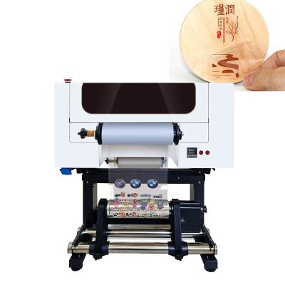 China A3-Größe UV-Roll Dtf Drucker für Aufkleber Druck Roll zu Roll Drucker auf alle Produkte zu verkaufen