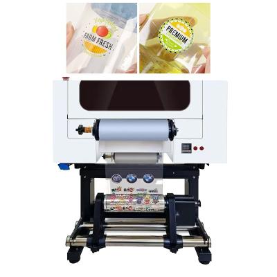 Chine Imprimante UV DTF haute résolution 300 mm Machine UV DTF pour bouteille de plastique acrylique à vendre