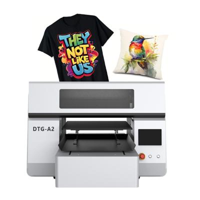 China Double Station A2 DTG Direct to Garment Printer White Ink & Color Printing System for sale