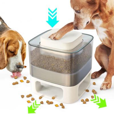 China New Sustainable Pet Food Feeder Automatic Dog Pet Wheels Cat And Dog Food Dispenser Square Pressing Top Automatic Feeder for sale