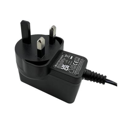 China Convenient Eahunt Professional UK Plug Charger DC12V 1A Wall Plug Switching Power Adaptor Factory Price Charging for sale