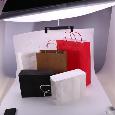 China Custom high-end portable creative packaging clothing packaging environmental protection gift recycled shopping paper bag advertising for sale