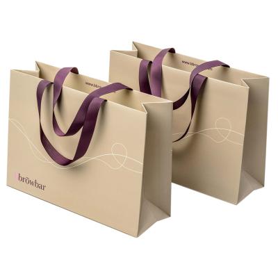 China Fashionable Custom Luxury Clothing Retail Bag Packing Gift Bag Bolsas De Papel Pink Packaging Paper Bags With Handles For Clothes for sale