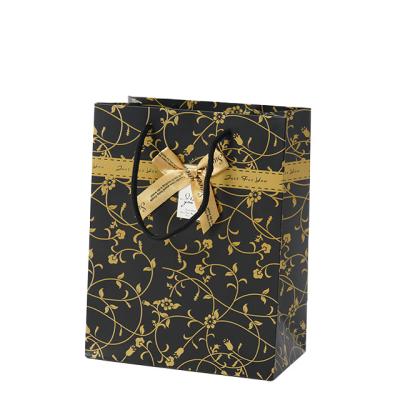 China Wholesale Bow Tie Personalized Logo Paper Luxury Foldable Shopping Bag Fashionable Custom Black Craft Apparel Gift For Boutique for sale