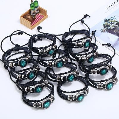 China Wholesale Bulk 12 BOHEMIA Wax Zodiac Leather Bracelet Rope Tie Wrap Cheap Multi Adjustable Zodiac Leather Bracelet for sale