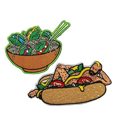 China Other Hot Dog Man Wholesale Cheap Design Woven Embroidery Patch Noodle Embroidery Patch for sale