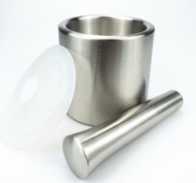 China Viable Wholesale Cylinder Mortar and Pestle Set with Silicone Lid, Garlic Pugging Jar for sale