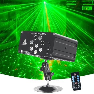 China Amazon Theme Park Hot Selling 8 Holes Mini DJ Laser Lights For Sale Laser Stage Beam Lights 4 in1 RGB Sound Activated Party Light for sale