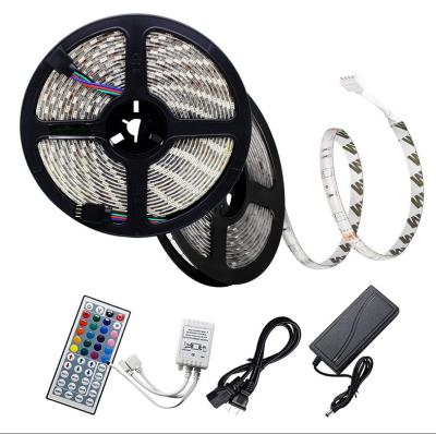 China Residential smd5050 RGB 30/60leds/m Waterproof IP65 12v led strip light with 24/44key IR 5m remote control 10m kit for sale