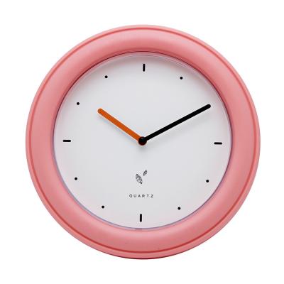 China 12 O'Clock Show New Design Pink Round Plastic Wall Clock For Home Decorative for sale