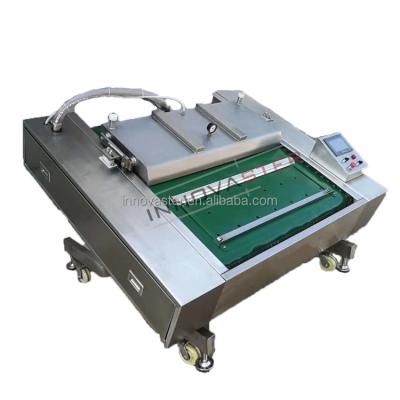 China 750 KG Capacity Automatic Rotary Rolling Vacuum Packaging Machine for Smooth Operation for sale